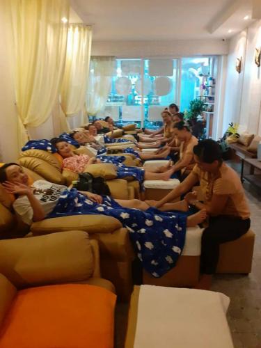 Friends having massage in Patong